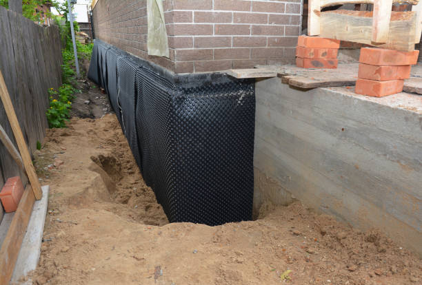 Happy homeowners after waterproofing job in Unionville Center